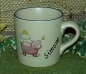 Preview: Keramik-Tasse  - Becher mit Wunschname – Motiv: 2 x Schwein mit Sonne