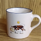 Preview: Keramik-Tasse  - Becher mit Wunschname – Motiv: 2 x Kuh mit Sonne