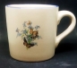 Preview: Keramik-Tasse mit Wunschname – Motiv: 2 x Schmetterlinge und Vergissmeinnicht – 50 mm