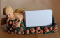 Preview: Visitenkartenhalter – Putte auf Rosen – 12,7 cm lang  – Handarbeit aus Keramik – Unikat