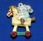 Preview: ALBERTAS–Gießform – neu – Maus auf Schaukelpferd - Ornament – Hänger – 9,2 cm – Design auf Vorder-​ und Rückseite