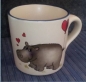 Preview: Keramik-Tasse  - Becher mit Wunschtext – Motiv: 1 x großes Nilpferd mit Herz