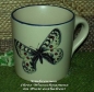 Preview: Keramik-Tasse  - Becher mit Wunschname – Motiv: 1 x Schmetterling 75 mm