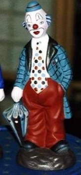 Clown mit Schirm – 19 cm hoch – Schrühware