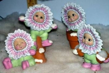 Poinsetta-Babys im 4er-Set – bis 24 cm hoch – Schrühware