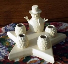 Stern-Kerzenständer mit 4 Kerzenhaltern und Schneemann - 22 cm Durchmesser - Schrühware