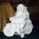 Weihnachtsmann auf Motorrad – 23 cm hoch - Schrühware