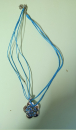 Collier – 46 cm - 4reihig – türkis – Blüte mit türkisen Steinen – Anhänger 35 mm – Modeschmuck aus Metall und Glassteinen