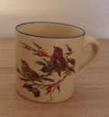 Keramik-Tasse  - Becher mit Wunschname – Motiv: 1 x Wintervögel / Clafinch